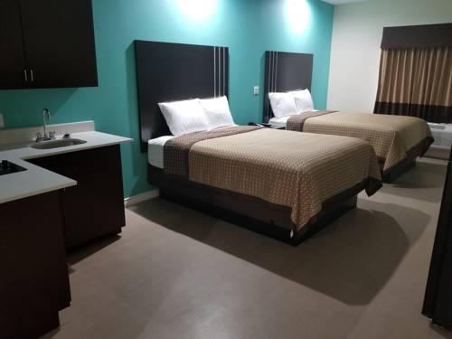 Imagen de la habitación del Hotel Scottish Inns and Suites. Foto 6