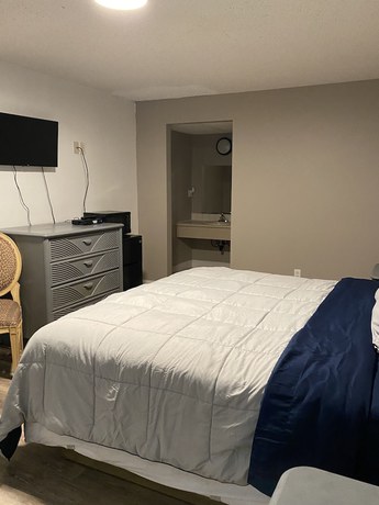 Imagen de la habitación del Hotel Scottish Inns and Suites. Foto 9