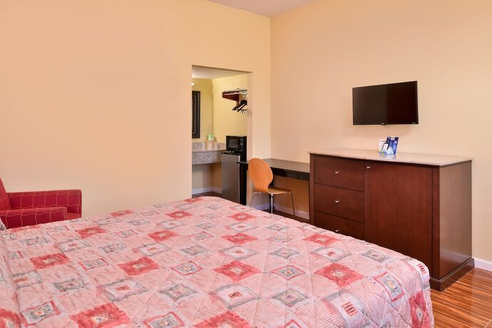 Imagen de la habitación del Hotel Scottish Inns and Suites. Foto 14