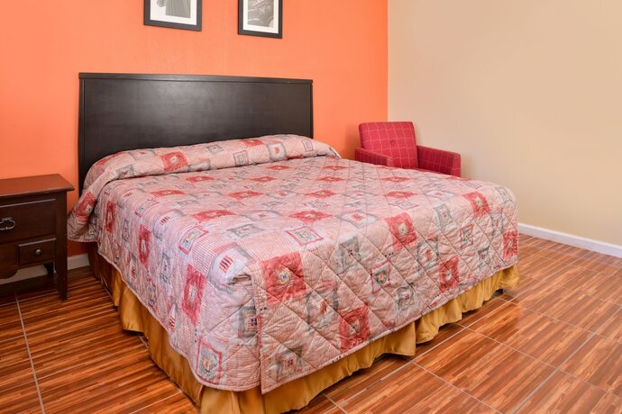 Imagen de la habitación del Hotel Scottish Inns and Suites. Foto 17