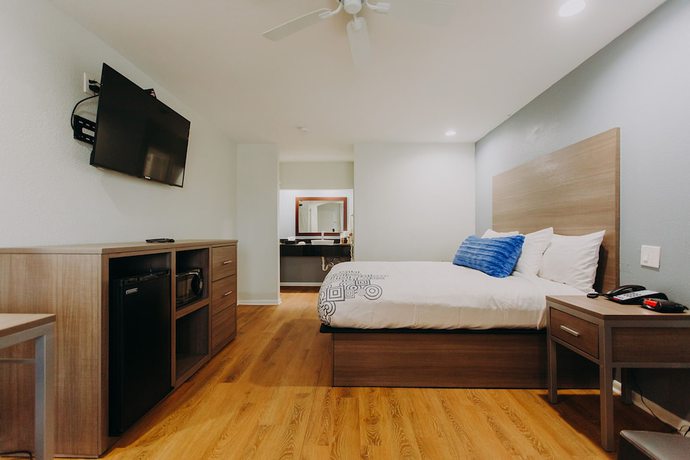 Imagen de la habitación del Hotel Scottish Inns and Suites - Near Kemah Boardwalk. Foto 10