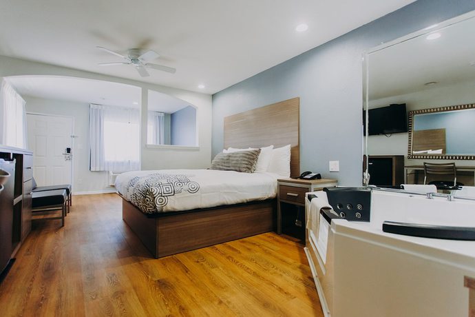 Imagen de la habitación del Hotel Scottish Inns and Suites - Near Kemah Boardwalk. Foto 19