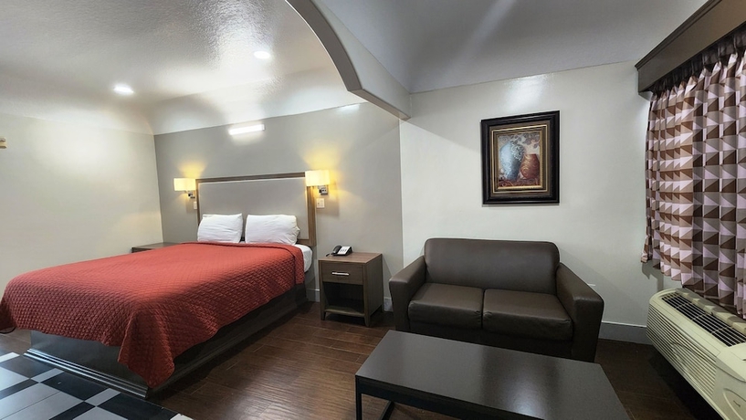 Imagen de la habitación del Hotel Scottish Inns and Suites Sam Houston Pkwy. Foto 4