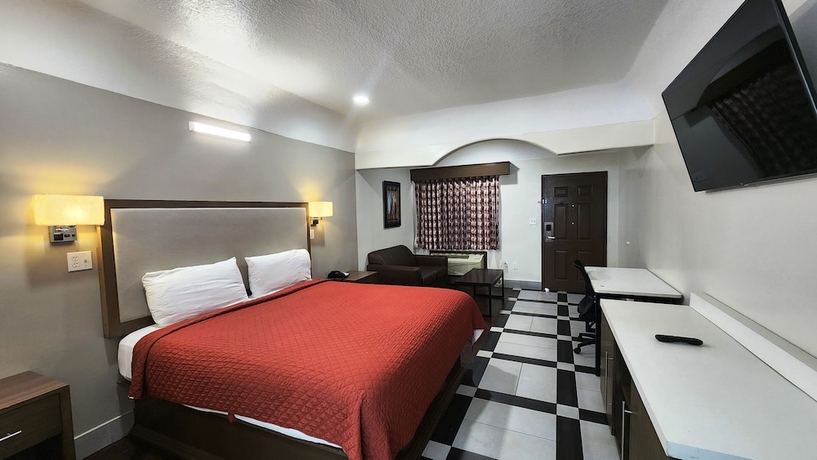 Imagen de la habitación del Hotel Scottish Inns and Suites Sam Houston Pkwy. Foto 5