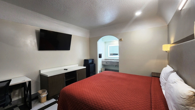 Imagen de la habitación del Hotel Scottish Inns and Suites Sam Houston Pkwy. Foto 6