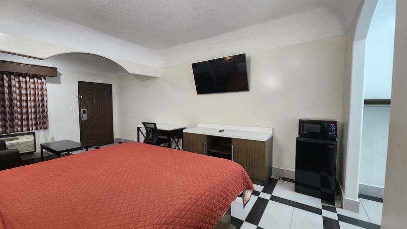 Imagen de la habitación del Hotel Scottish Inns and Suites Sam Houston Pkwy. Foto 7
