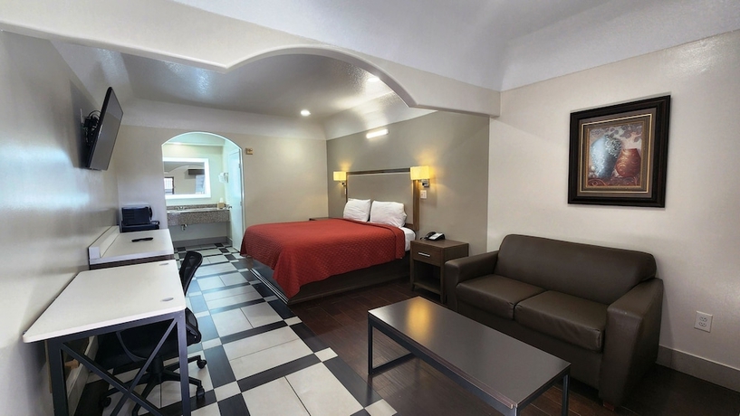Imagen de la habitación del Hotel Scottish Inns and Suites Sam Houston Pkwy. Foto 8