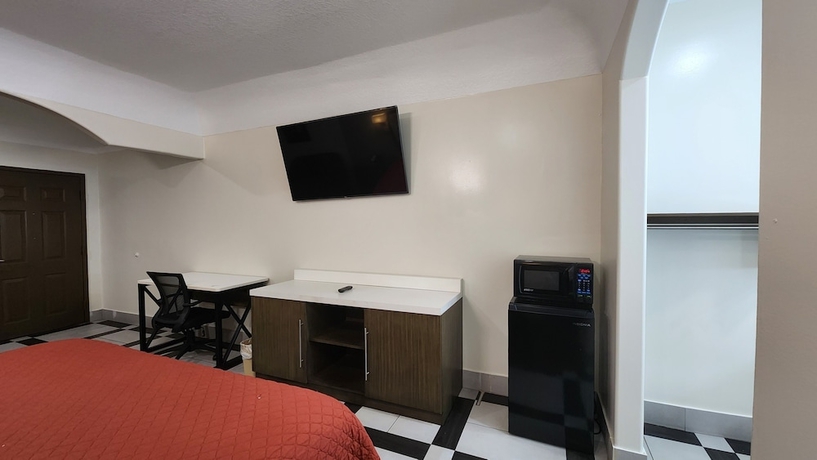Imagen de la habitación del Hotel Scottish Inns and Suites Sam Houston Pkwy. Foto 10
