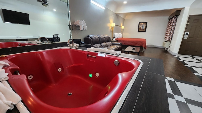 Imagen de la habitación del Hotel Scottish Inns and Suites Sam Houston Pkwy. Foto 12