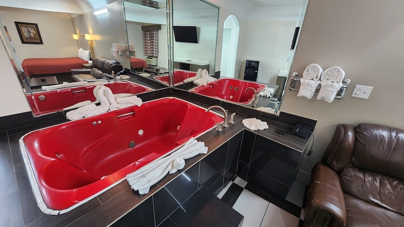 Imagen de la habitación del Hotel Scottish Inns and Suites Sam Houston Pkwy. Foto 16