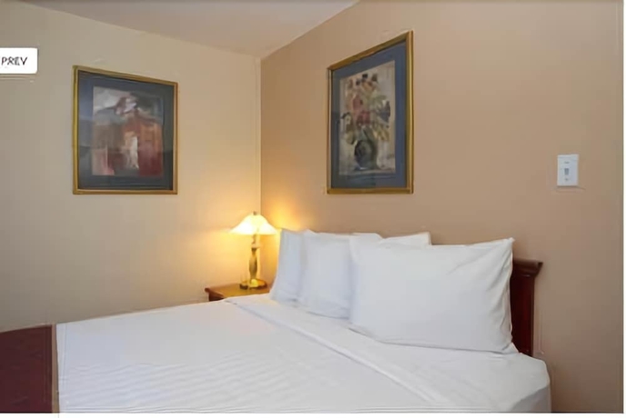 Imagen de la habitación del Hotel Scott's Inn and Suites. Foto 4