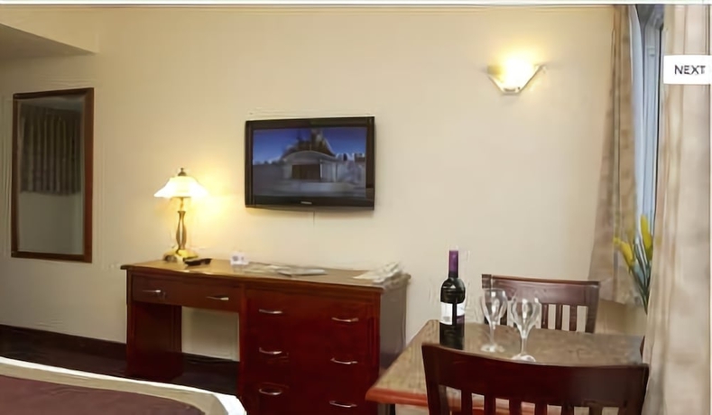 Imagen de la habitación del Hotel Scott's Inn and Suites. Foto 10