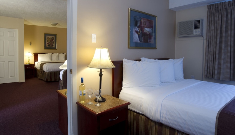 Imagen de la habitación del Hotel Scott's Inn and Suites. Foto 13