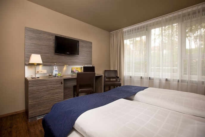 Imagen de la habitación del Hotel Scotty + Emily Hotel Ulm, Sure Hotel Collection by BW. Foto 7