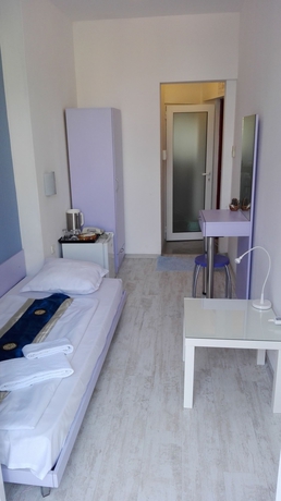 Imagen de la habitación del Hotel Scottys Boutique. Foto 5