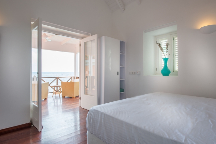 Imagen de la habitación del Hotel Scuba Lodge and Ocean Suites. Foto 7