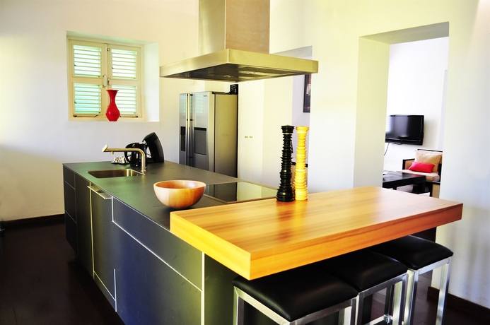 Imagen de la habitación del Hotel Scuba Lodge and Ocean Suites. Foto 9