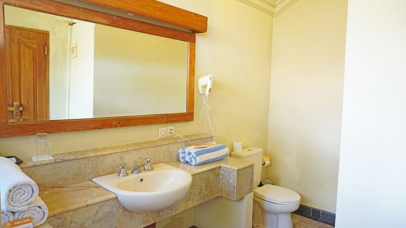 Imagen de la habitación del Hotel Scuba Seraya Resort. Foto 6