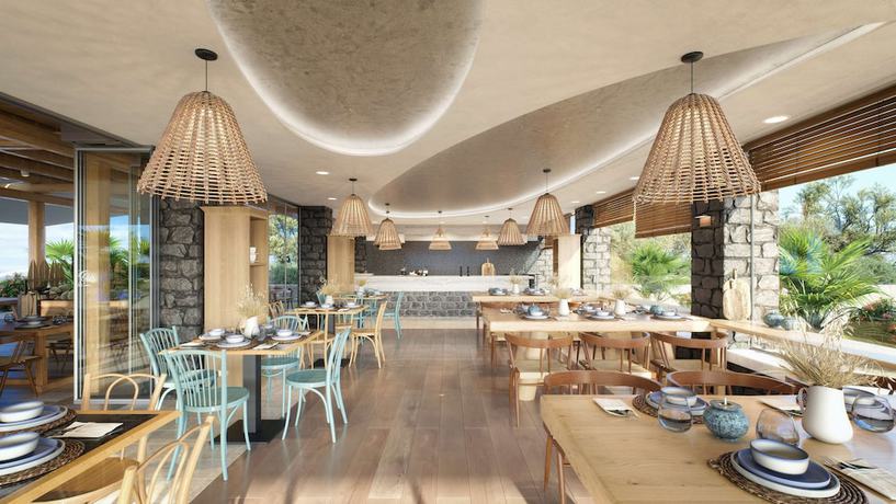 Imagen del bar/restaurante del Hotel Sea Breeze Santorini Beach Resort, Curio By Hilton. Foto 2