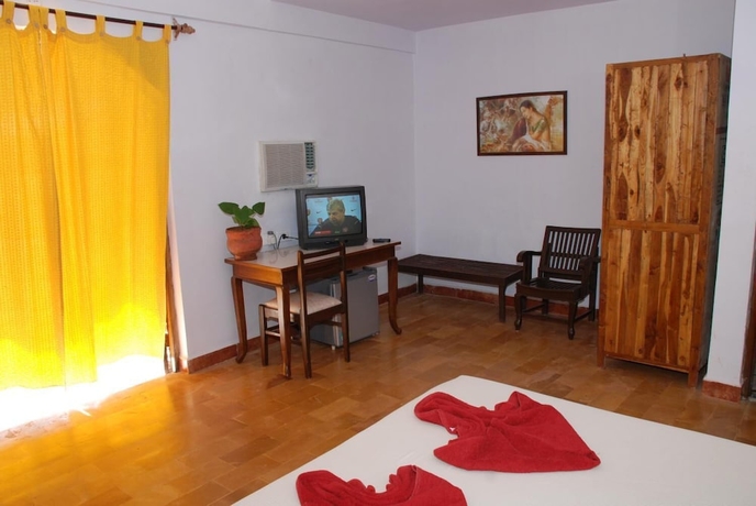 Imagen de la habitación del Hotel Sea Breeze Village Baga. Foto 7