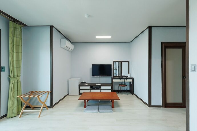 Imagen de la habitación del Hotel Sea Cliff Jeju. Foto 16