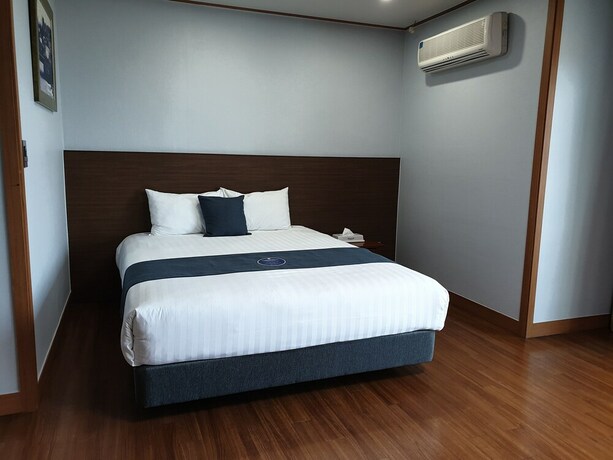 Imagen de la habitación del Hotel Sea Cliff Jeju. Foto 19