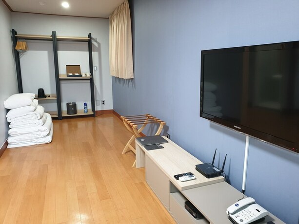 Imagen de la habitación del Hotel Sea Cliff Jeju. Foto 21
