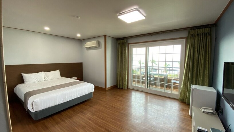 Imagen de la habitación del Hotel Sea Cliff Jeju. Foto 23