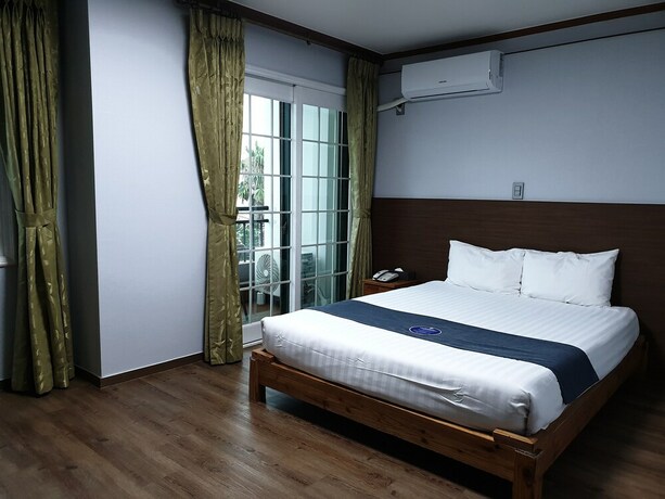 Imagen de la habitación del Hotel Sea Cliff Jeju. Foto 24