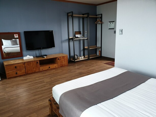 Imagen de la habitación del Hotel Sea Cliff Jeju. Foto 30