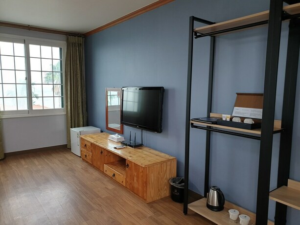 Imagen de la habitación del Hotel Sea Cliff Jeju. Foto 33