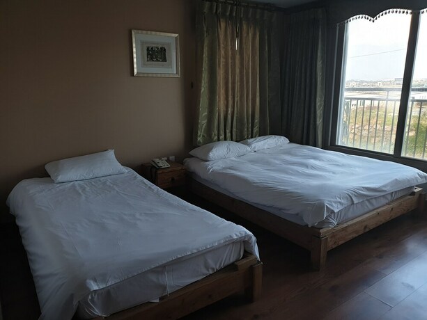 Imagen de la habitación del Hotel Sea Cliff Jeju. Foto 37