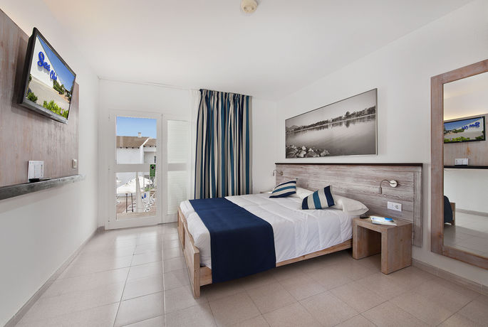 Imagen de la habitación del Hotel Sea Club Mediterranean Resort. Foto 15