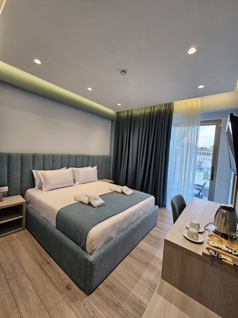 Imagen de la habitación del Hotel Sea Coast Resort Halkidiki. Foto 9
