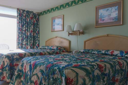 Imagen de la habitación del Hotel Sea Dip Oceanfront. Foto 10