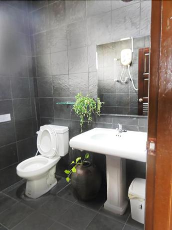Imagen de la habitación del Hotel Sea Harmony Eco Lodge. Foto 16