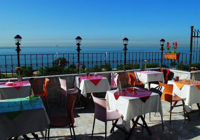 Imagen del bar/restaurante del Hotel Sea House Suites. Foto 7