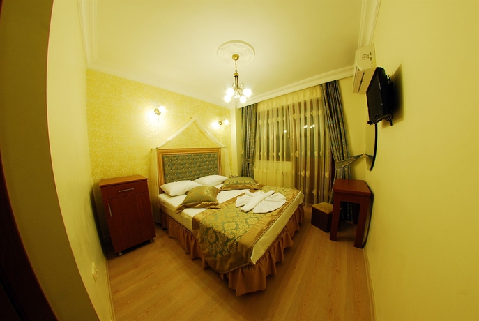 Imagen de la habitación del Hotel Sea House Suites. Foto 12