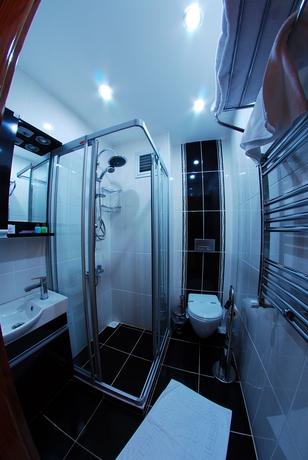 Imagen de la habitación del Hotel Sea House Suites. Foto 13