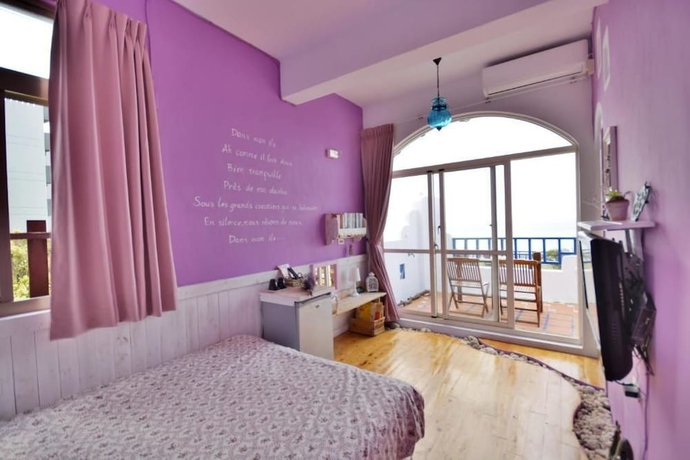 Imagen de la habitación del Hotel Sea House homestay. Foto 9