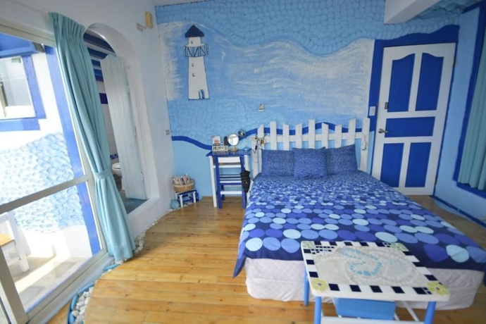 Imagen de la habitación del Hotel Sea House homestay. Foto 15