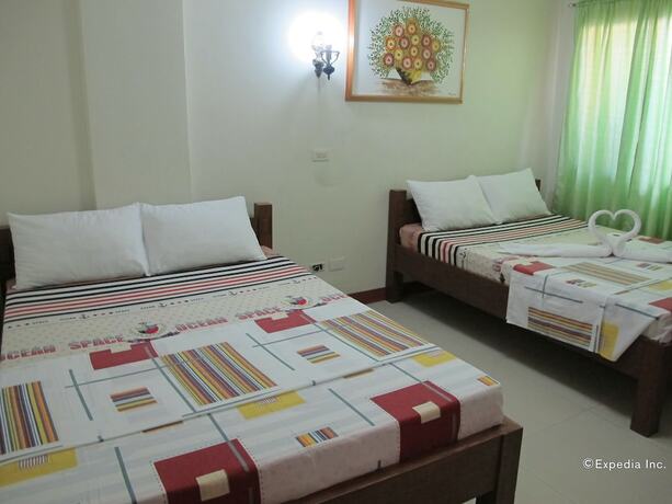 Imagen de la habitación del Hotel Sea Jewel Beach Resort Puerto Galera. Foto 18