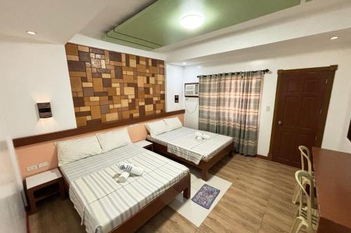 Imagen de la habitación del Hotel Sea Jewel Puerto Galera powered by Cocotel. Foto 18