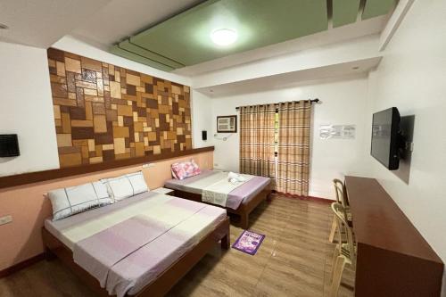 Imagen de la habitación del Hotel Sea Jewel Puerto Galera powered by Cocotel. Foto 19