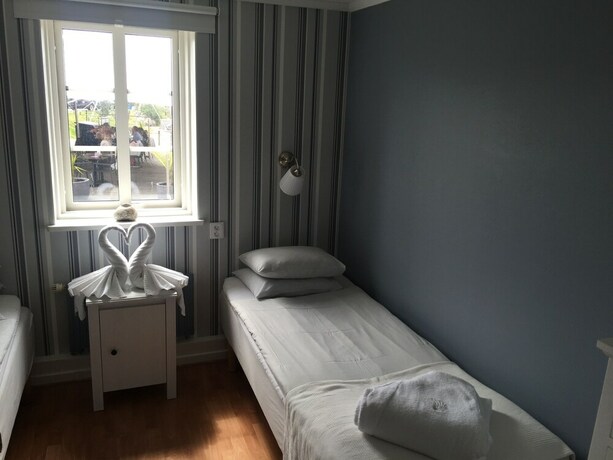 Imagen de la habitación del Hotel Sea Lodge. Foto 21