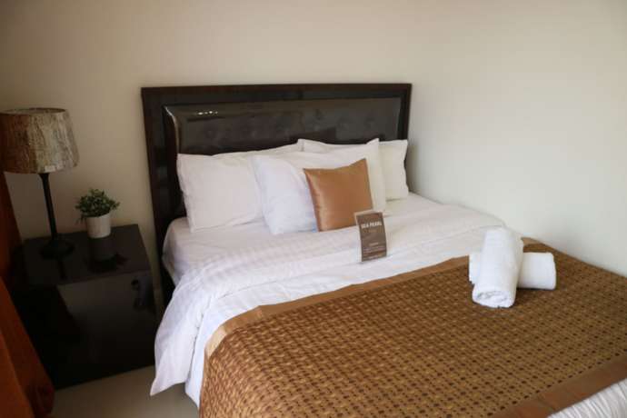 Imagen de la habitación del Hotel Sea Pearl Manila Suites. Foto 4