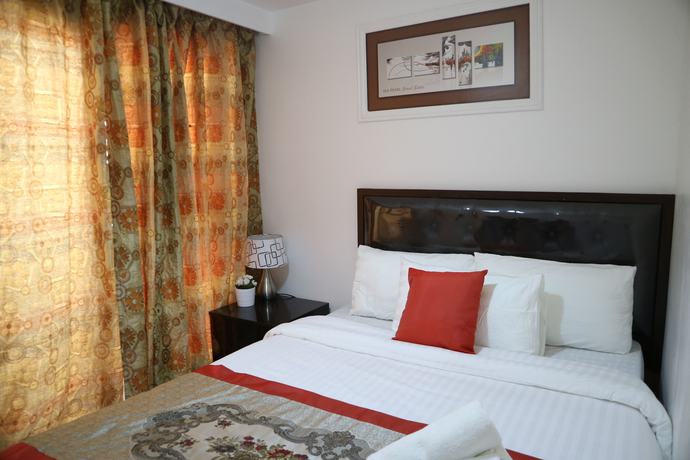 Imagen de la habitación del Hotel Sea Pearl Manila Suites. Foto 5