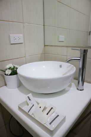 Imagen de la habitación del Hotel Sea Pearl Manila Suites. Foto 10