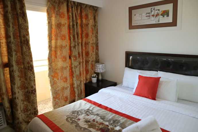 Imagen de la habitación del Hotel Sea Pearl Manila Suites. Foto 12