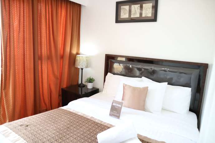 Imagen de la habitación del Hotel Sea Pearl Manila Suites. Foto 14